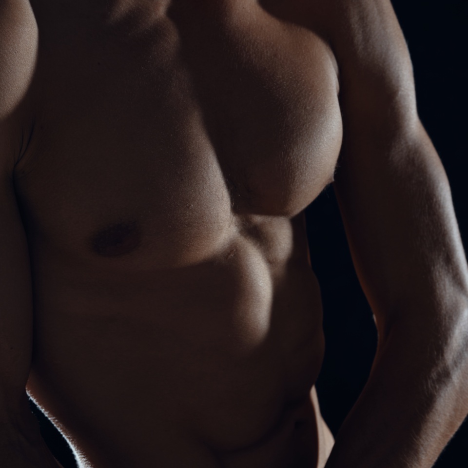 Inflated torso cropped look athlete bodybuilder