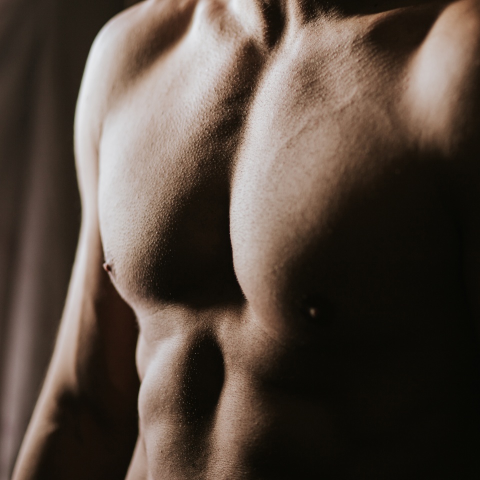 man with athletic body, highlights the texture of the skin