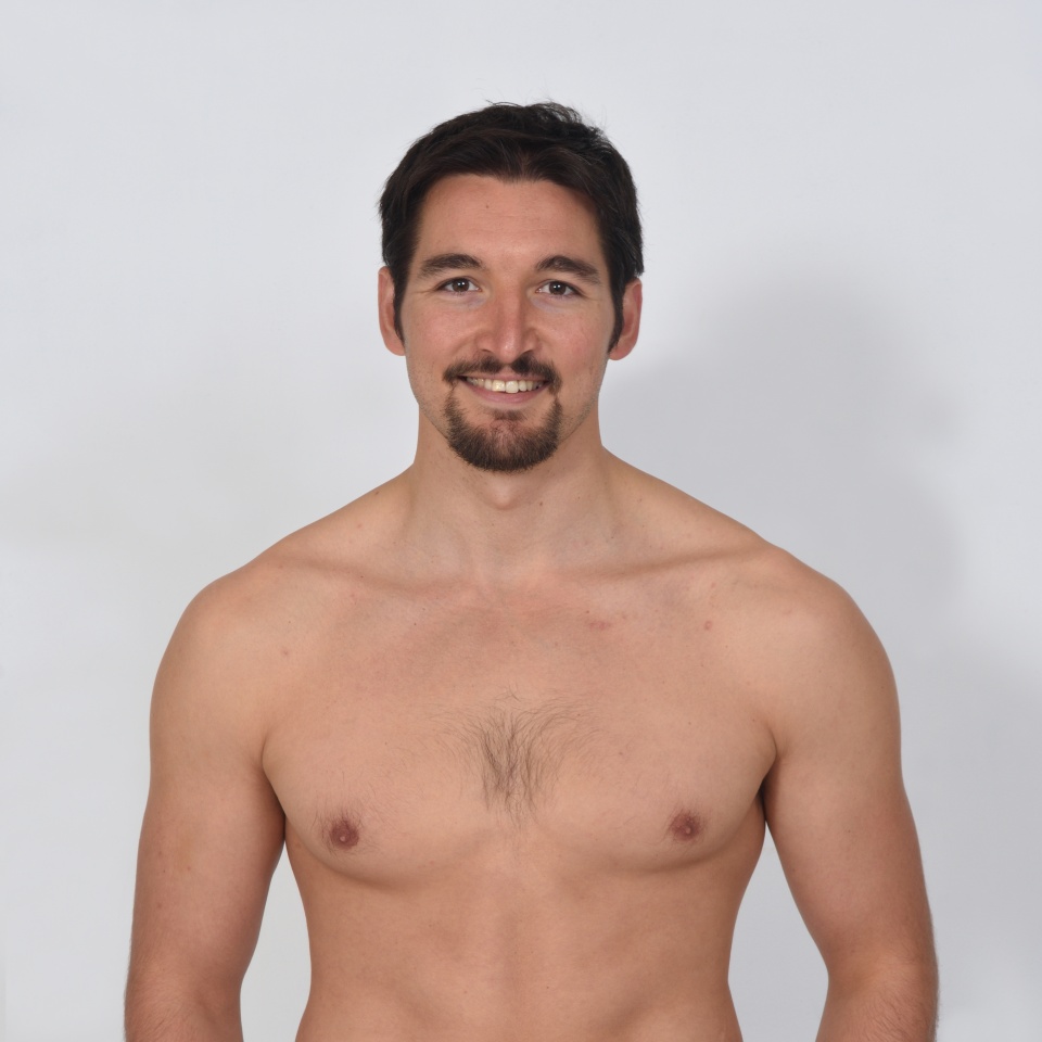 portriat of a man shirtless smiling and hands on pocket on white background