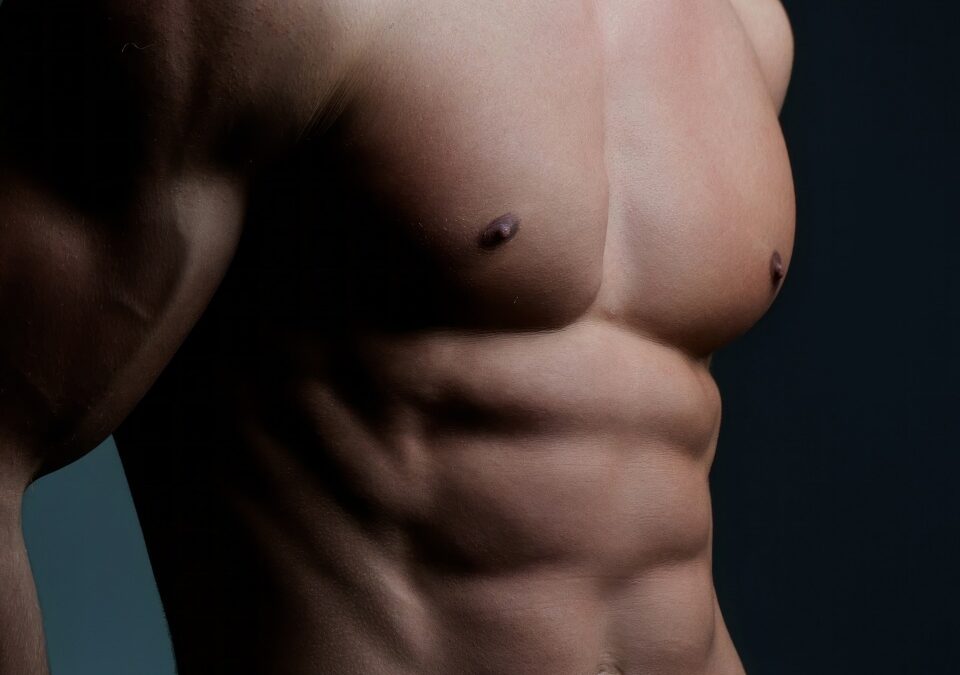 Male chest. Perfect abs, shoulders, and chest. Close up the Abs. Closeup torso. Ab. Muscular chest and ripped abs. Sexy male muscular body. Man with naked torso showing chest and six pack abs.