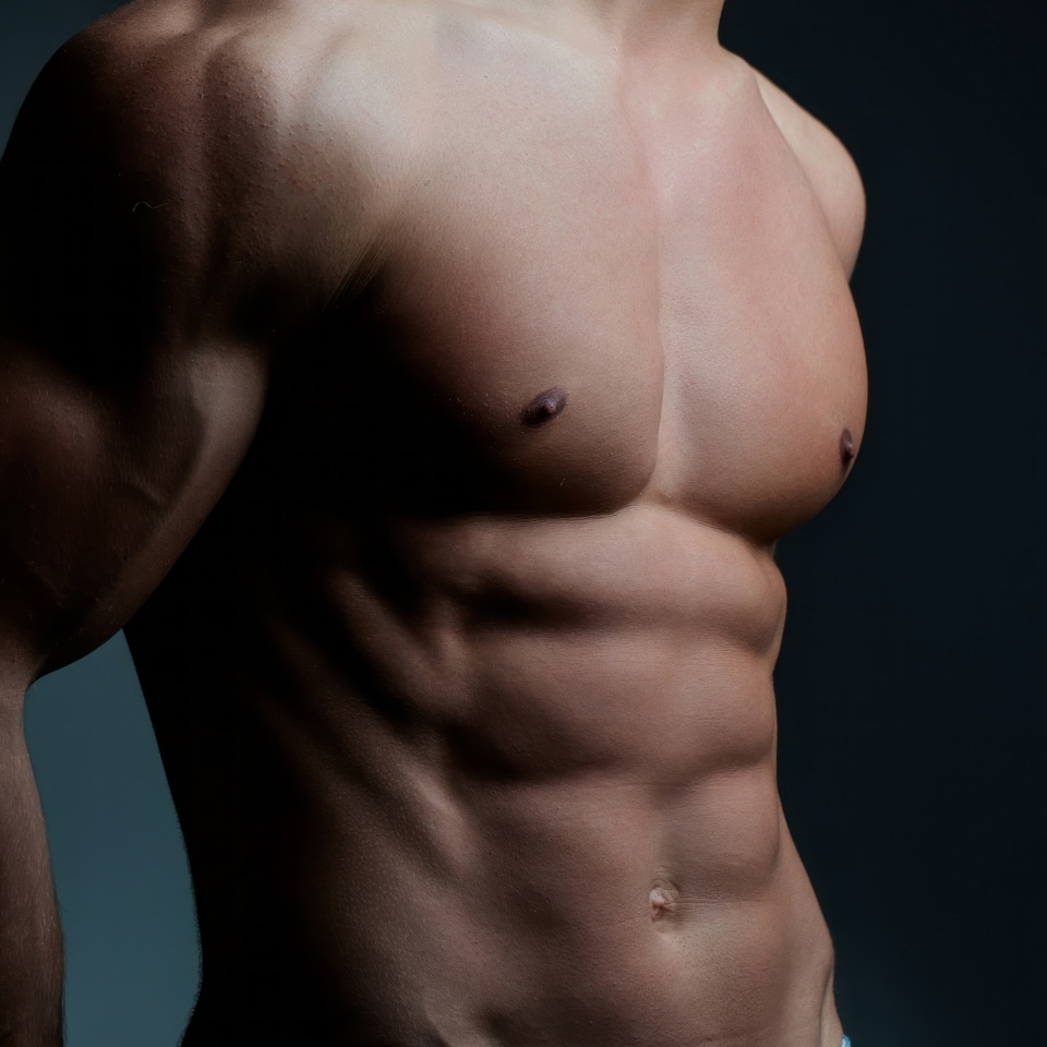 Male chest. Perfect abs, shoulders, and chest. Close up the Abs. Closeup torso. Ab. Muscular chest and ripped abs. Sexy male muscular body. Man with naked torso showing chest and six pack abs.