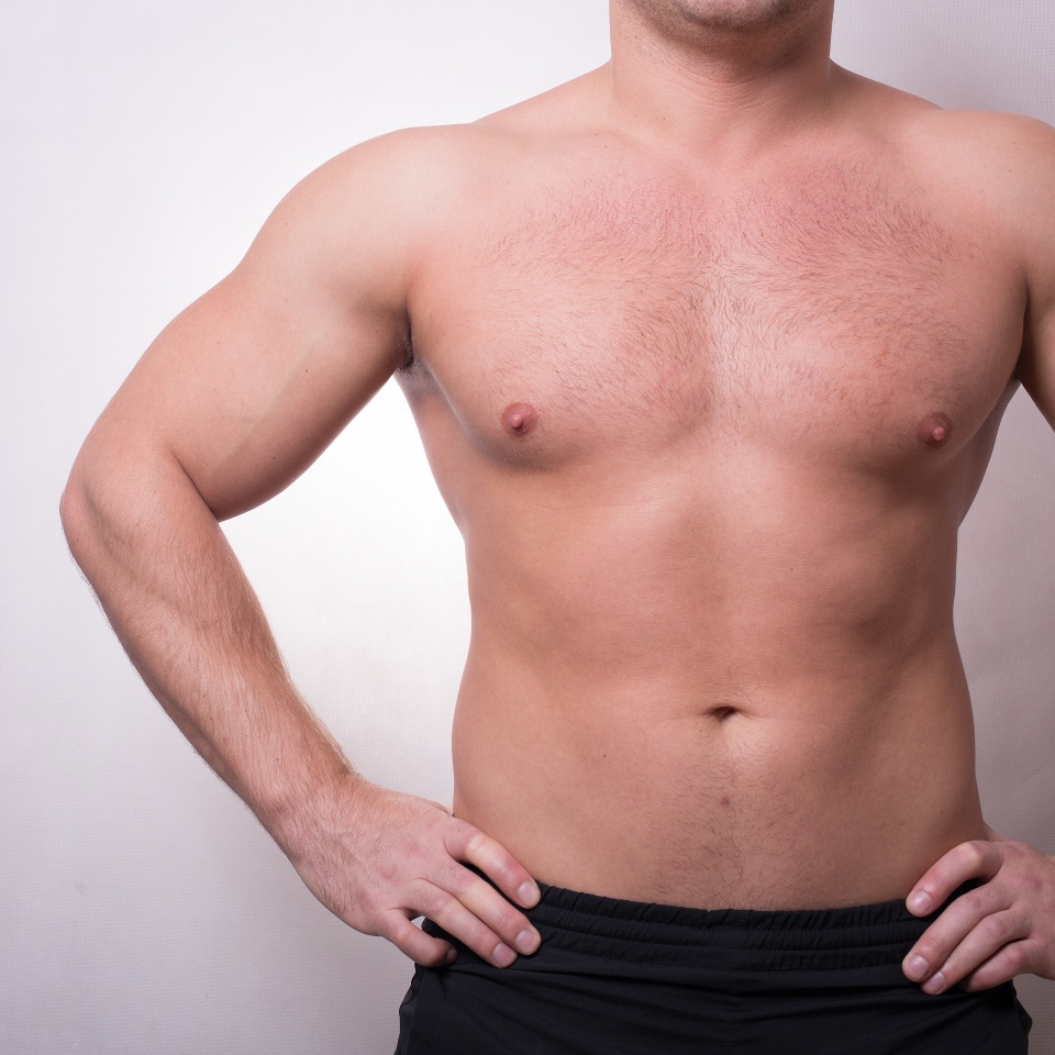 muscular sport strong healthy body of a young man. healthy lifestyle.